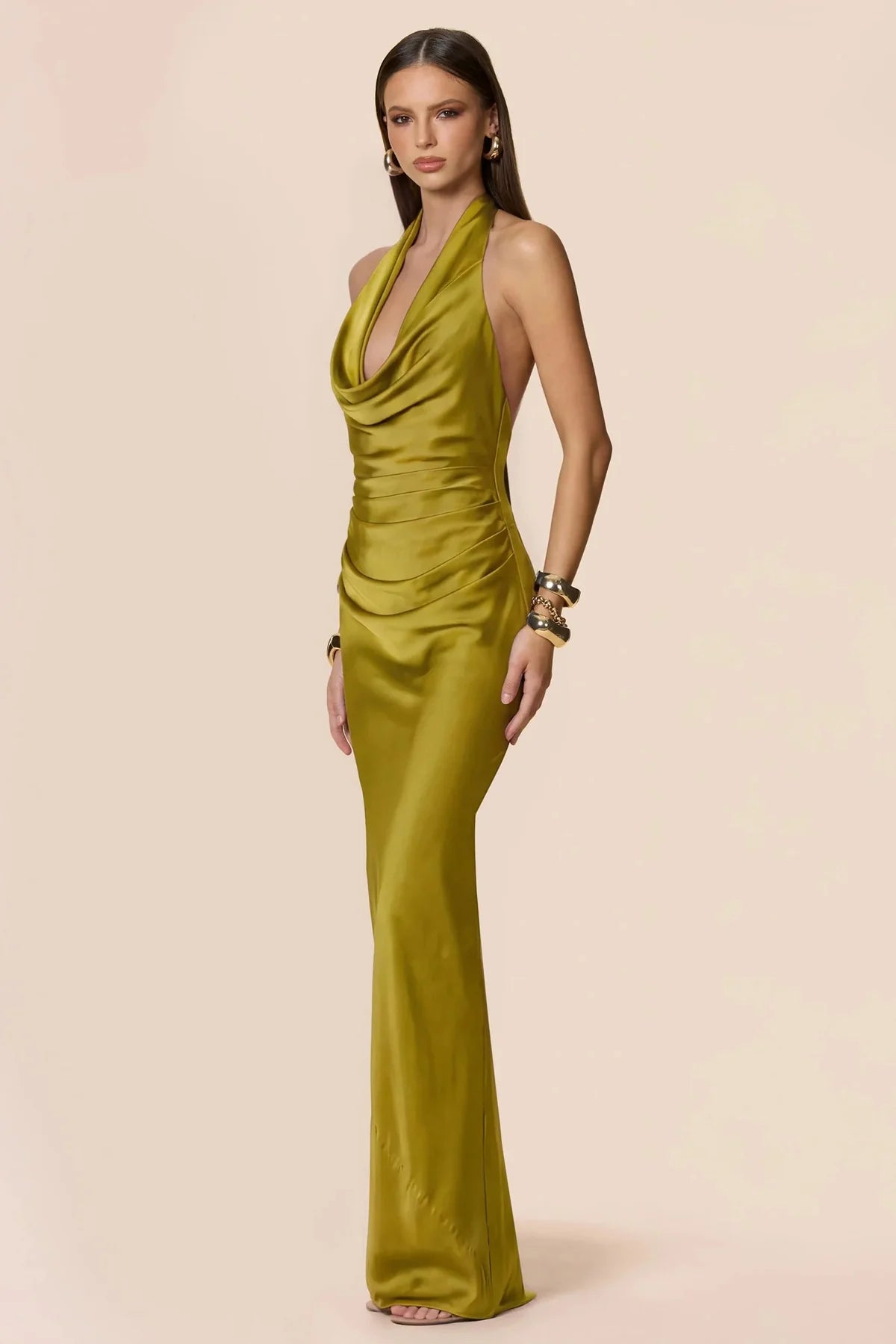 Penelope Drape Gown in chartreuse by Nookie, side view of the halter neck and gathered side-waist tucks
