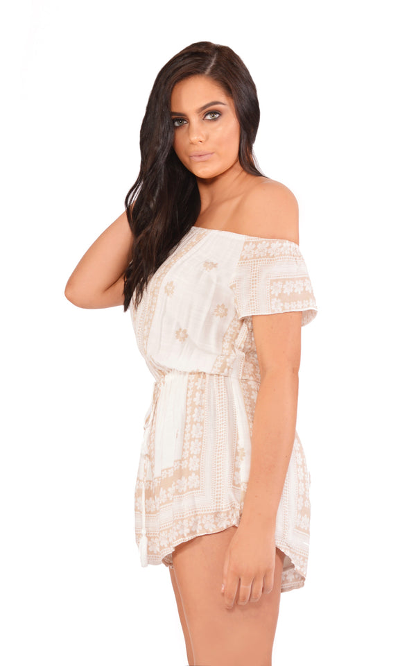 Reverse Playsuit, side view of the Pleasures Playsuit in white print.